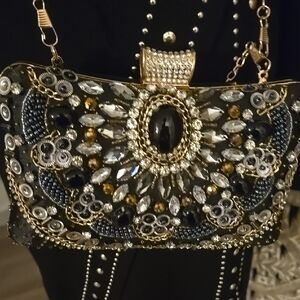 Elegant Black and Gold Embellished Clutch